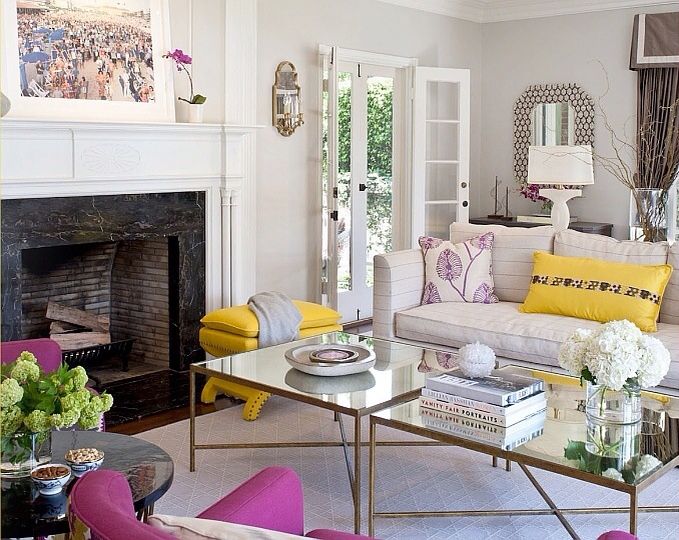 A living room with yellow and pink furniture - perfect for spring.