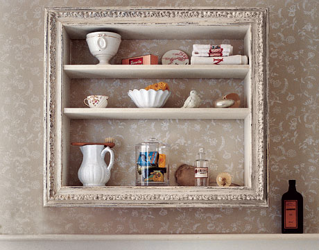 A shelf takes on a different look with a repurposed frame (tudorks.wordpress)