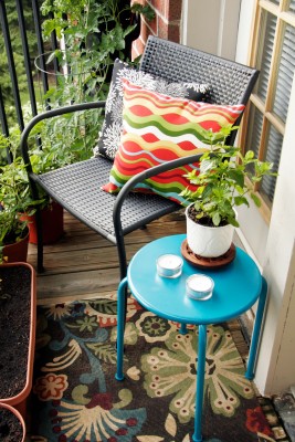 A simple chair and table for relaxing on the balcony