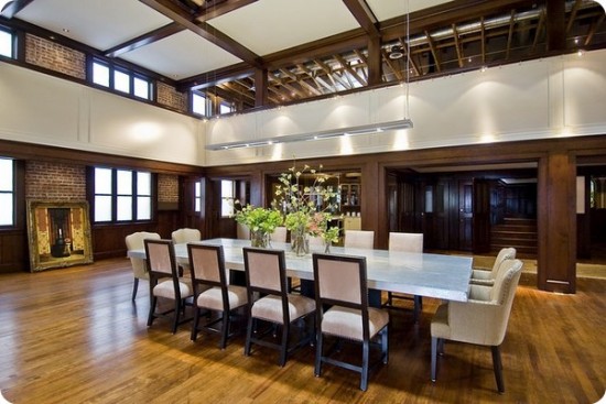 A spacious dining room with hardwood floors transformed from a church to a home design conversion.