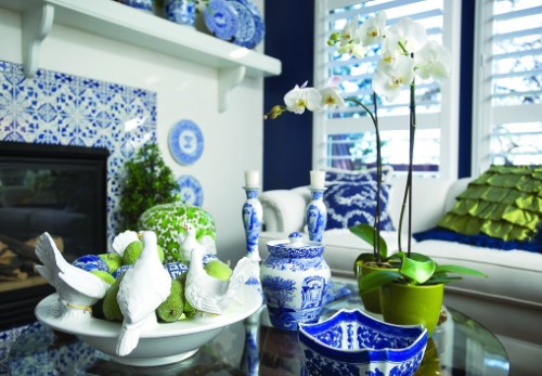 Green accessories update this blue and white décor 