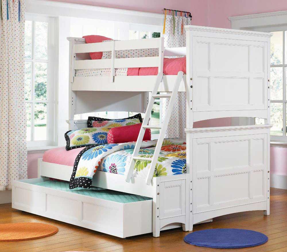 A white bunk bed with a trundle.