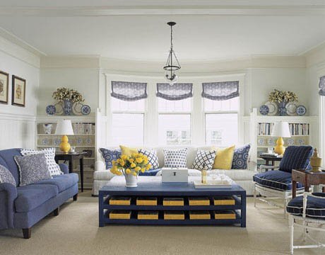 An updated living room with blue and yellow accents.