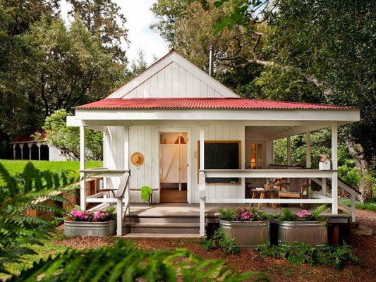 Front porch and landscaping add personality to tiny house
