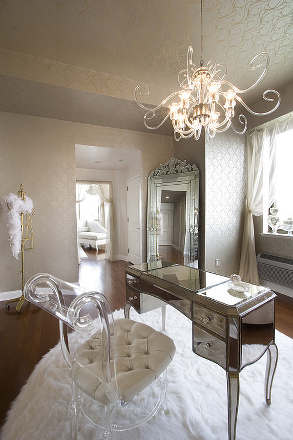 A Diva den with a white dresser and a chandelier.