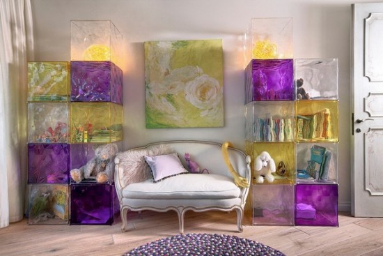 A girl's purple and yellow bedroom with bookshelves.