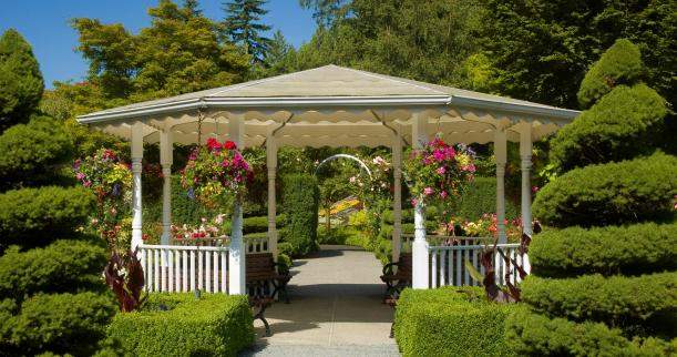 A gazebo accented with plants 