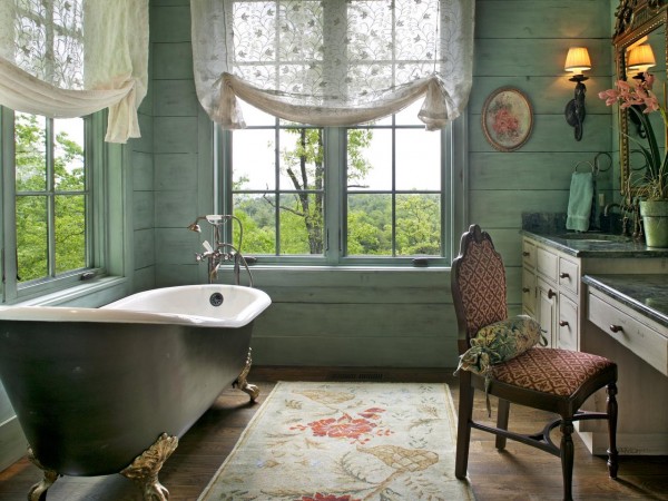 Roman shades add a touch of softness to this bathroom