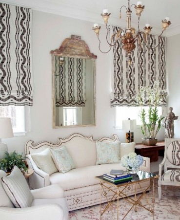Patterned shades make a great contrast with the white and coordinate with other fabrics and trim in the room
