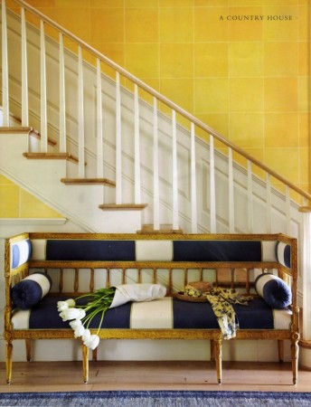 A yellow wall highlights the blue and white
