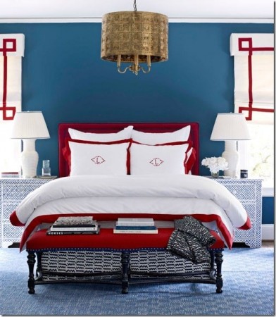 Red trim accents this blue and white bedroom (nauticalcottageblog)