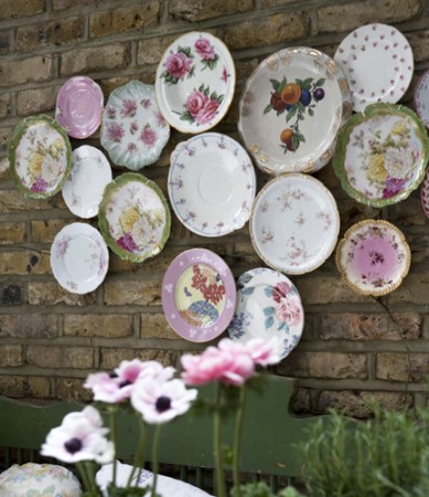 Plates decorate an outdoor space