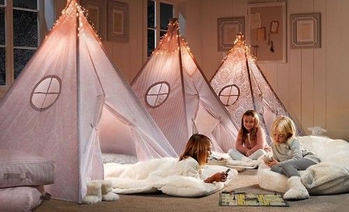 Kids teepee tents with lights for a girl's bedroom.