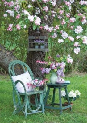 Create a charming spot under a tree in the backyard 