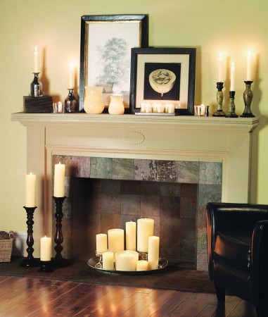 Candles add beautiful light to an off-season fireplace 