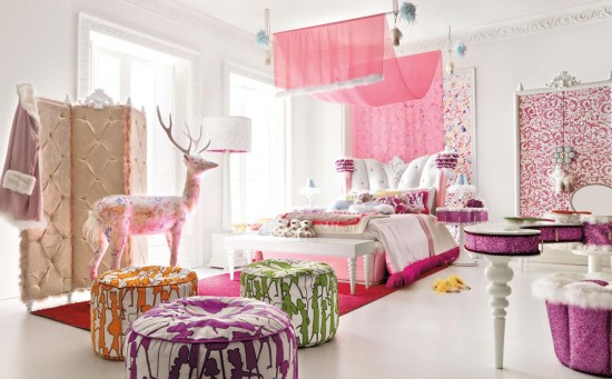 A pink and white bedroom with a deer.