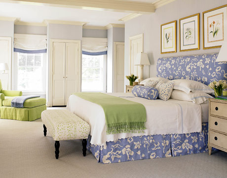 Green accents give color to this bedroom 