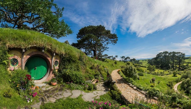 Experience the real Middle-Earth at the Hobbiton Movie Set, a Hobbit house in New Zealand.