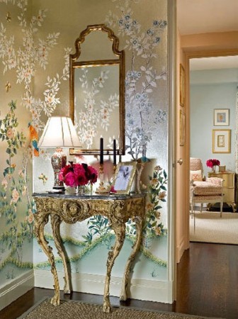 A traditional console table accents this foyer beautifully