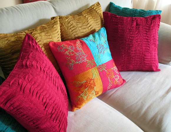 Decorative pillows on a white couch.