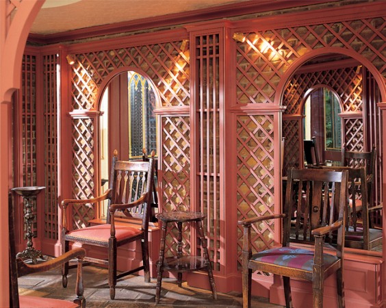 A room with latticework chairs.