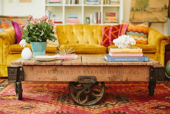 A living room with a bold, mobile coffee table.