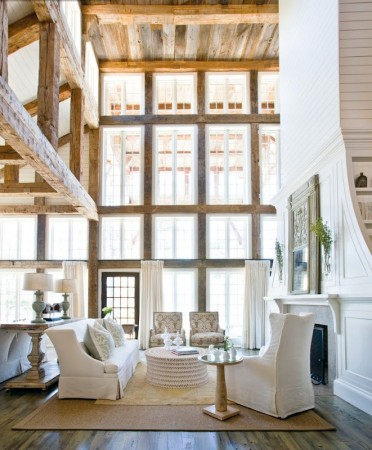 Recycled wood beams accent this light-filled home