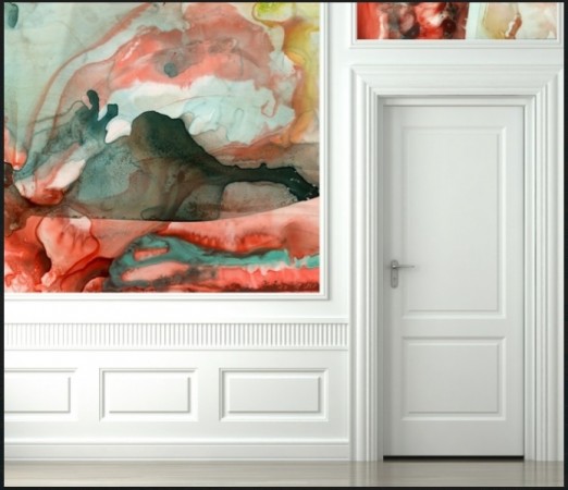 A room with an abstract watercolor painting on the wall.