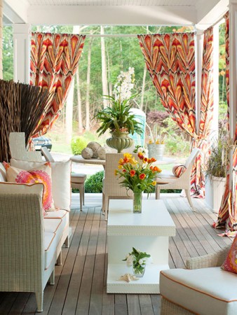 Curtains add color to this front porch