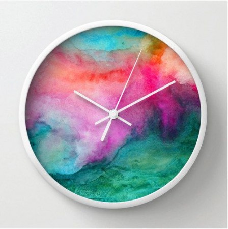 A watercolor wall clock adds a colorful touch to your home decor.