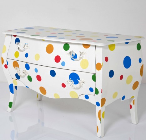 Fun and vibrant polka dots enhance this chest 