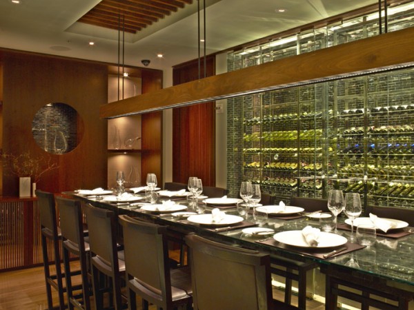 A long table for wine storage in a restaurant.