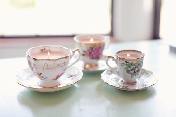 Decorating with candles on tea cups and saucers.