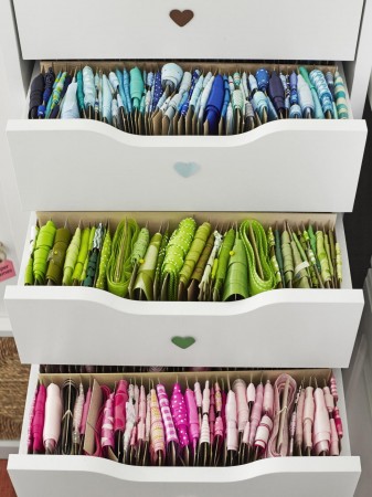 Desk drawers can hold color-coded fabrics