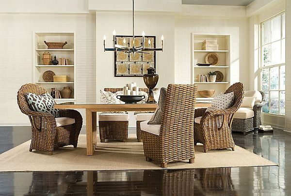 A rattan dining room set with a table and chairs perfect for an indoor space.