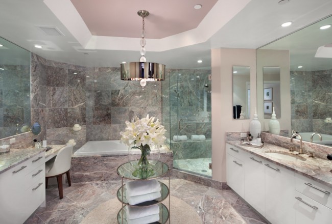A beautiful bathroom with a marble floor.