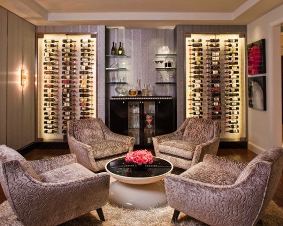 A wine room design inspiration and storage tips for a living room with a wine rack and chairs.