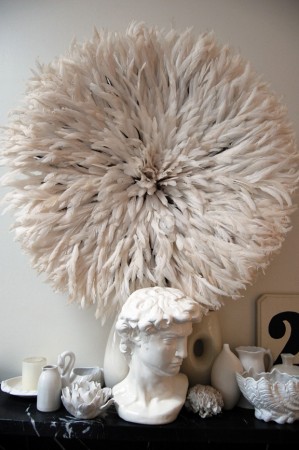 Feathery wall hangings add texture and interest