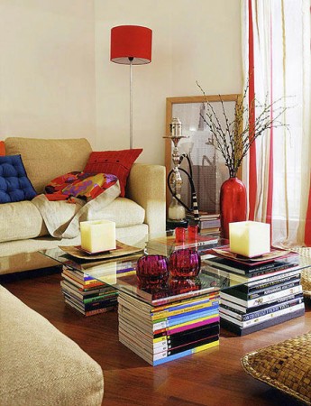 A living room with books, a coffee table.