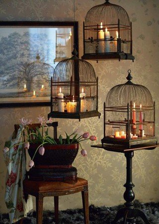 Display candles in decorate birdcages