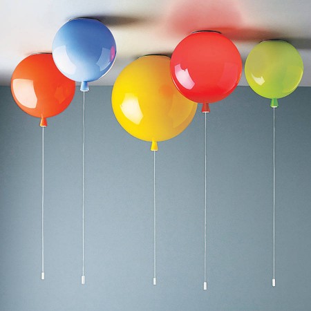A group of balloons hanging from the ceiling, stylish home.