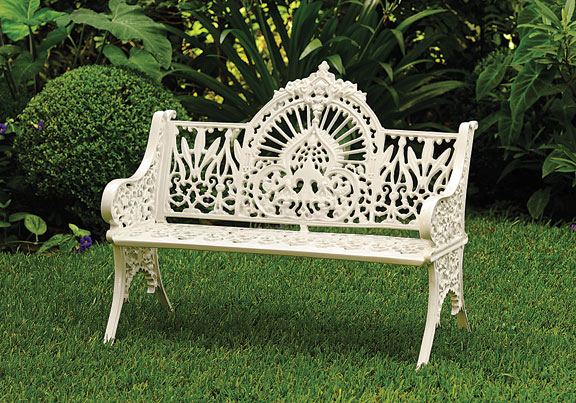A classic white wrought iron bench 