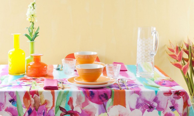 A vibrant tablecloth in a watercolor design style enhances your home decor.