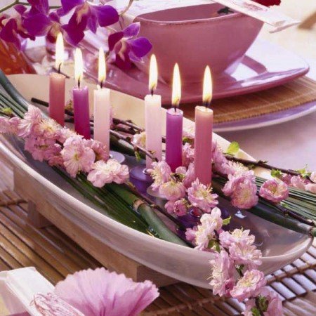 Decorating with pink candles.