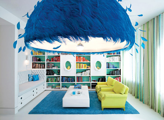 A living room with a hanging feather.