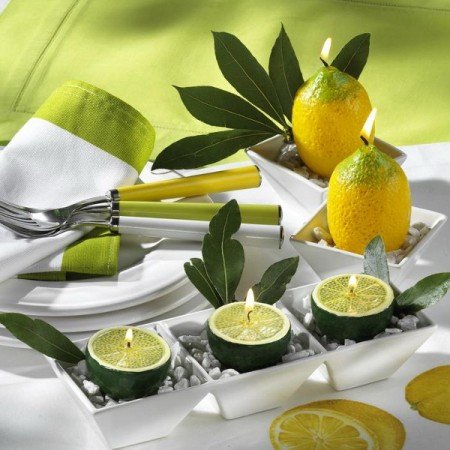 Unique fruit candles enhance a summer table