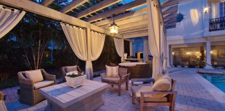 Curtains define this outdoor space