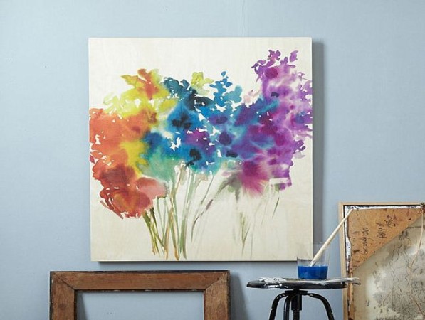 A watercolor painting accents the wall