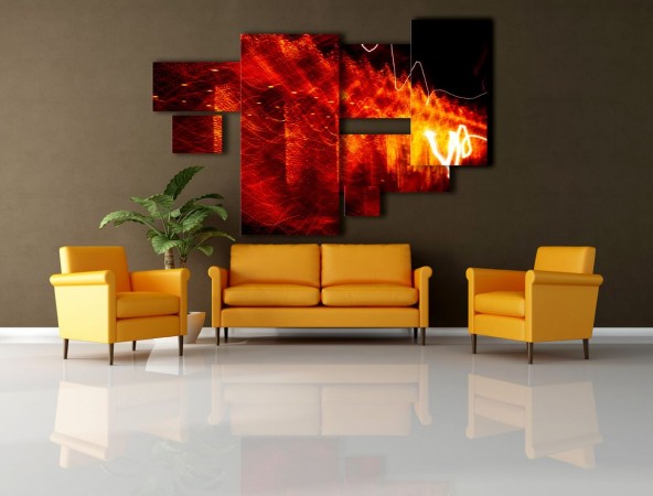 A living room with a stylish yellow couch and vibrant orange wall art.