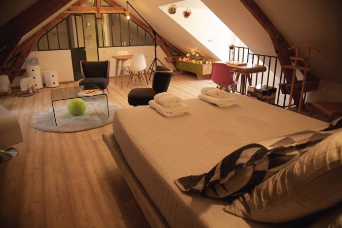 An attic room with wooden beams.
